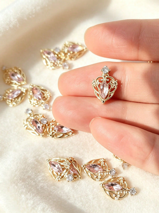 10pcs Luxury Hollow Crown Shaped Light Pink Gemstone Gold Trim Nail Art Decor, Vintage Filigree DIY Nail Accessories, Elegant Nail Rhinestone Decorations, Nail Art Supplies, Vintage Noble 3D Rhineston