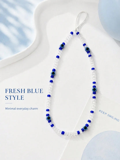 1pc Bohemian Evil Eye Beaded Phone Lanyard Blue Transparent Seed Bead Handmade Thin White String Wrist Strap Decor For Cell Phone CCD Camera Handbag Lucky Amulet Aesthetic Accessory Birthday Gift For