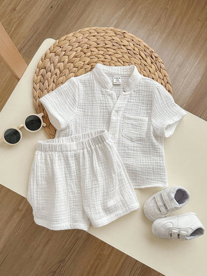 2pcs Baby Boy Solid Color Notch Neck Short Sleeve Top And Elastic Waist Shorts Set
