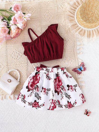2pcs/Set Baby Girl Fashion Cute Solid Color Asymmetric-Shoulder Camisole Top Paired With Butterfly & Flower Pattern Skirt, Summer Daily Outings & Vacation New Arrival