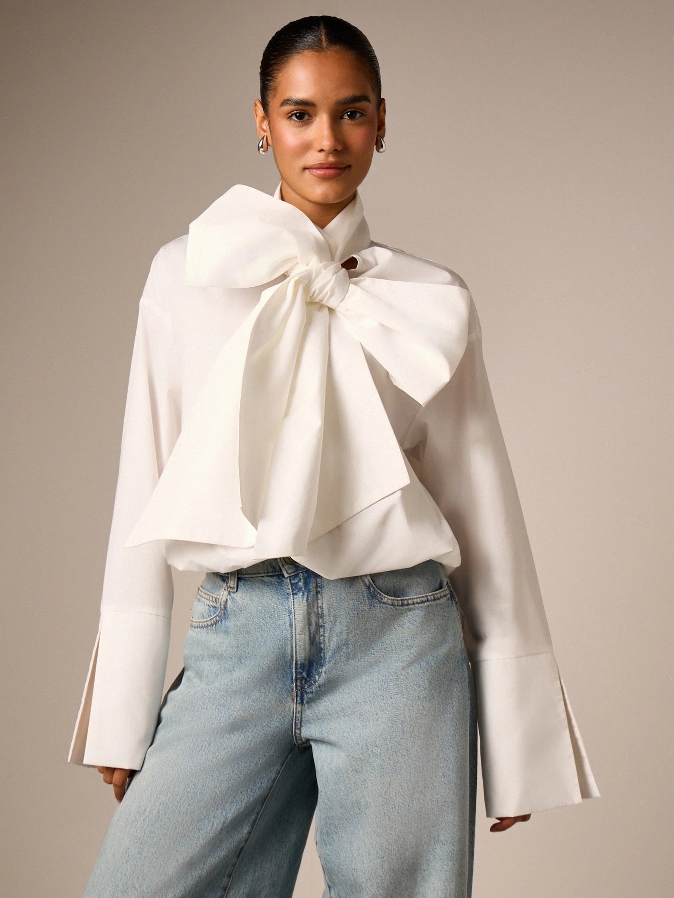 AiiRZ Elegant Oversized Bow Detail Blouse With Long Bell Sleeves High Neck And Bubble Hem For Office And Special Occasions