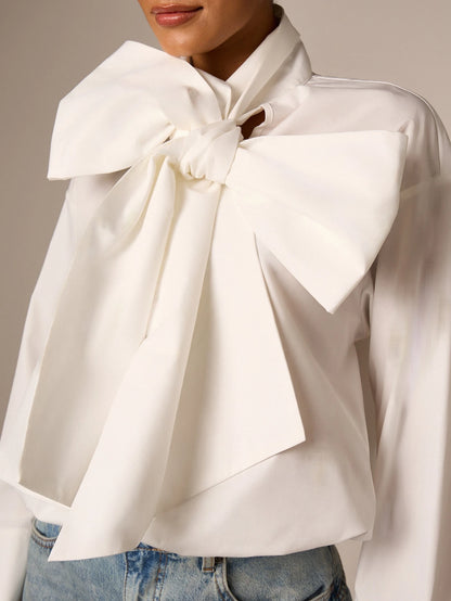 AiiRZ Elegant Oversized Bow Detail Blouse With Long Bell Sleeves High Neck And Bubble Hem For Office And Special Occasions