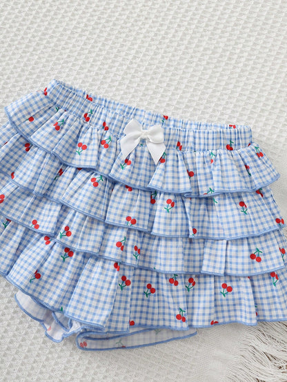 Cozy Pixies 2pcs Baby Girl Cute Cartoon Pattern Soft Knit Round Neck Short Sleeve Ruffle Top And Plaid Cherry Cake Elastic Waist Skirt Shorts Set