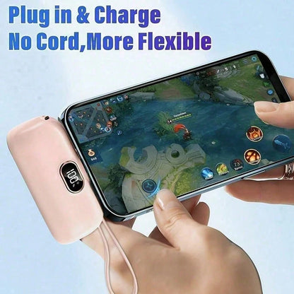 Mini Black 5000mAh Plug-In Power Bank With Lightning Tip, Built-In USB-C Cable And 22.5W Fast Charging, Featuring An LED Power Screen, Smooth Capsule Shape And Attached Lanyard For Grab-And-Go Use, Ma