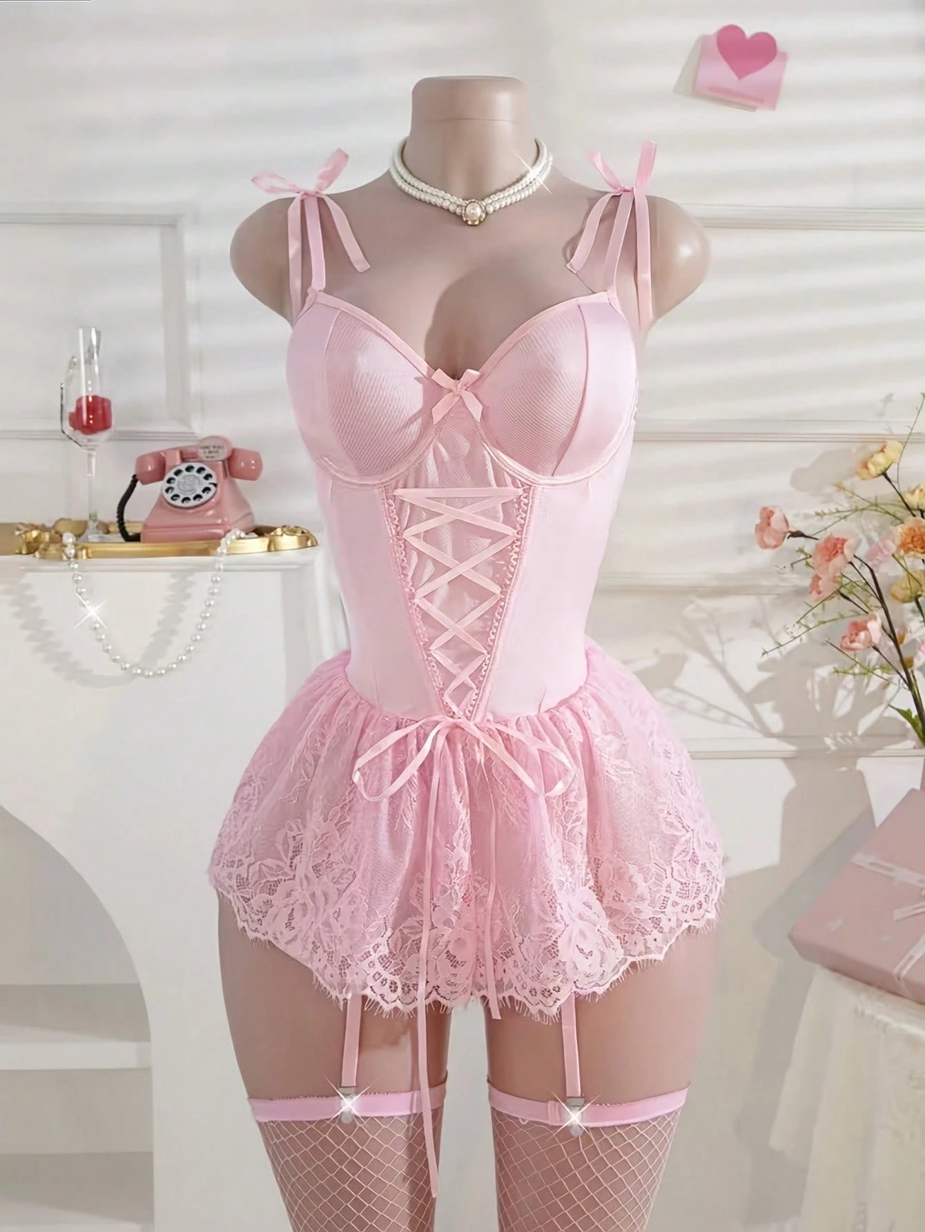 The Lady's Sexy Lingerie Set, With Bow-Shaped Shoulder Straps, Adjustable Waistband And Lace Patchwork, Paired With Fishnet Stockings, Is Extremely